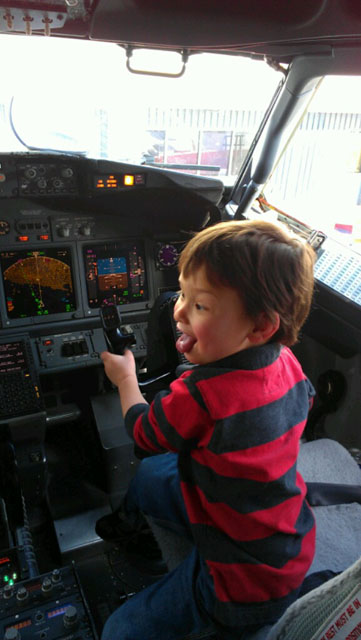 the co-pilot sticks out his tongue